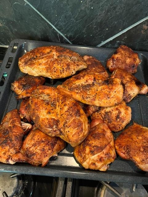Seasoned chicken coated with Monty's Backyard Legend BBQ rub